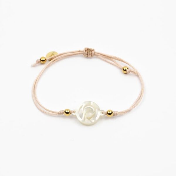 virgen nina pulsera cubitos nude